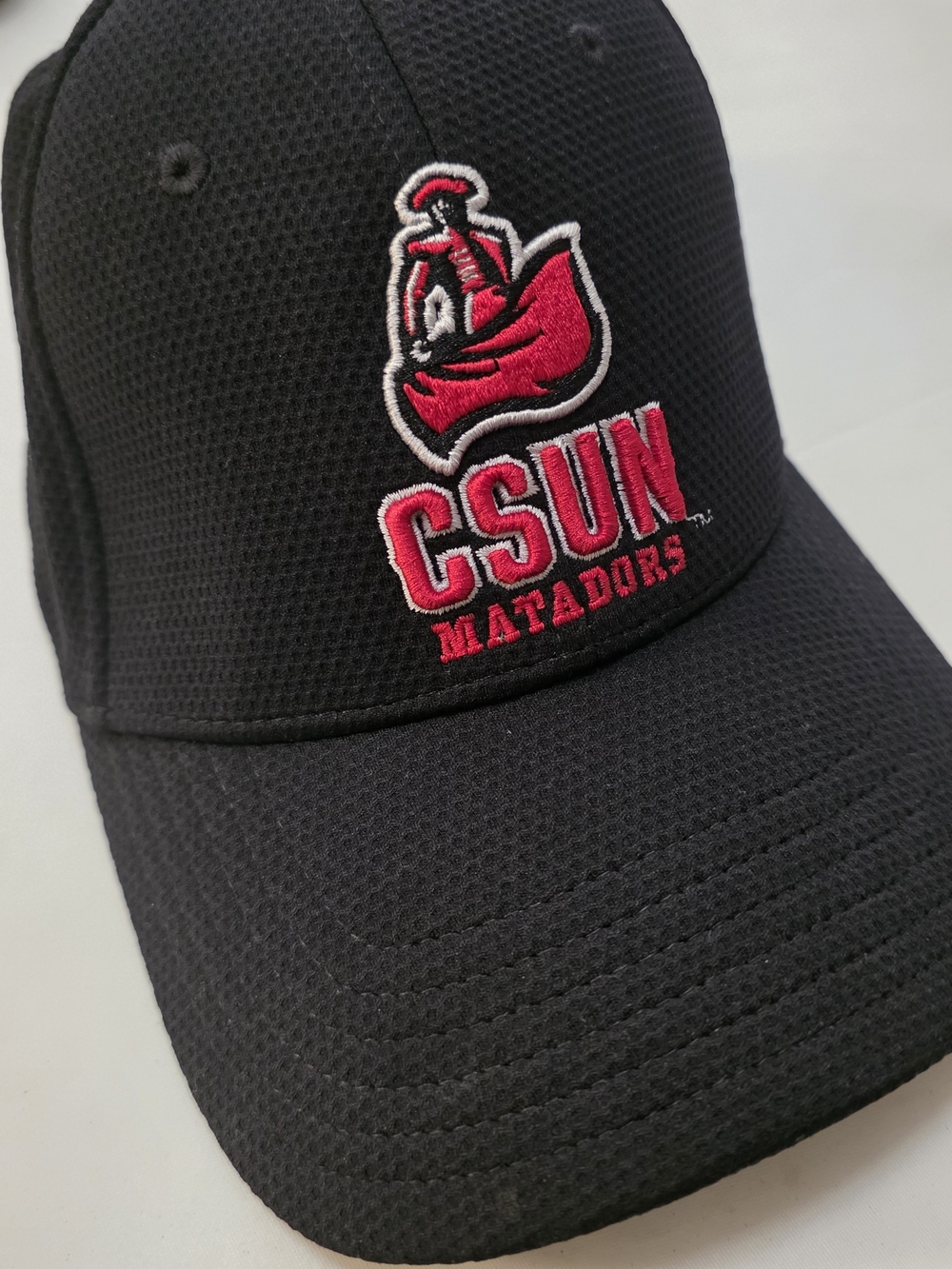 Under Armour Black Baseball Cap with Red CSUN Matadors Logo